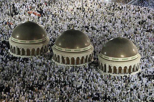Muslims circle the Kaaba inside the Grand Mosque during night prayer in Mecca December 13, 2007. Around 1.5 million Muslims from around the world are expected to arrive in Saudi Arabia for the haj pilgrimage. REUTERS/Ali Jarekji (SAUDI ARABIA)