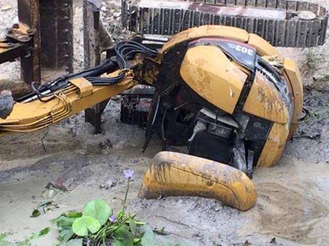 trapped-under-mud-2-664x498